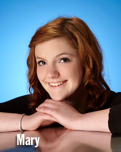 Studio One senior picture of girl in blue